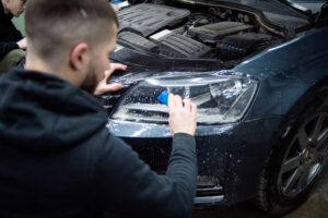 Headlight polishing & PPF for clear, protected lights at pro detailing service